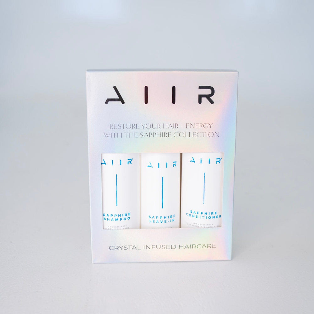 AIIR hair care product packaging on a white background