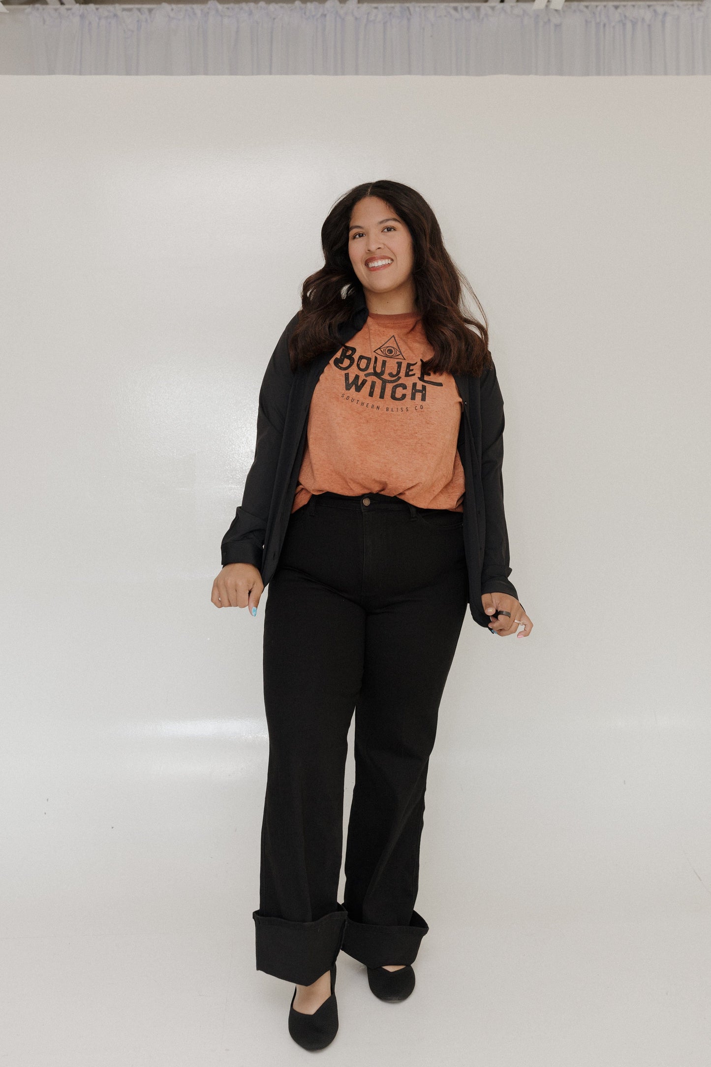 "BOUJEE WITCH" GRAPHIC TEE Woman wearing a brown t-shirt with 'Boujee Witch' text against a plain background at Love Marlow