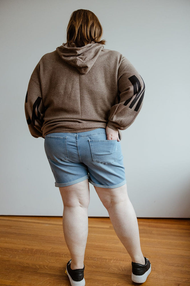 
            
                Load image into Gallery viewer, BUTTON FLY CUFFED SHORTS IN LIGHT WASH
            
        
