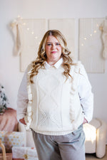 CABLE KNIT VEST WITH RUFFLE