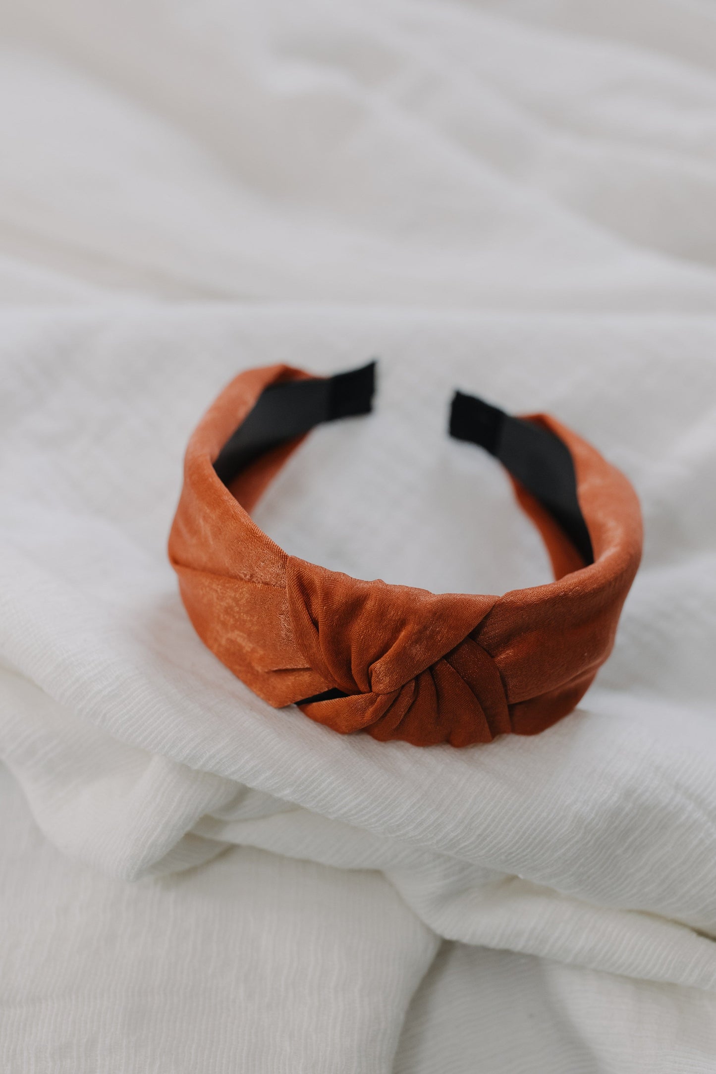 Clay headband with textured white background