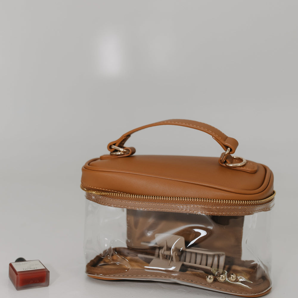 Brown handbag on a white background