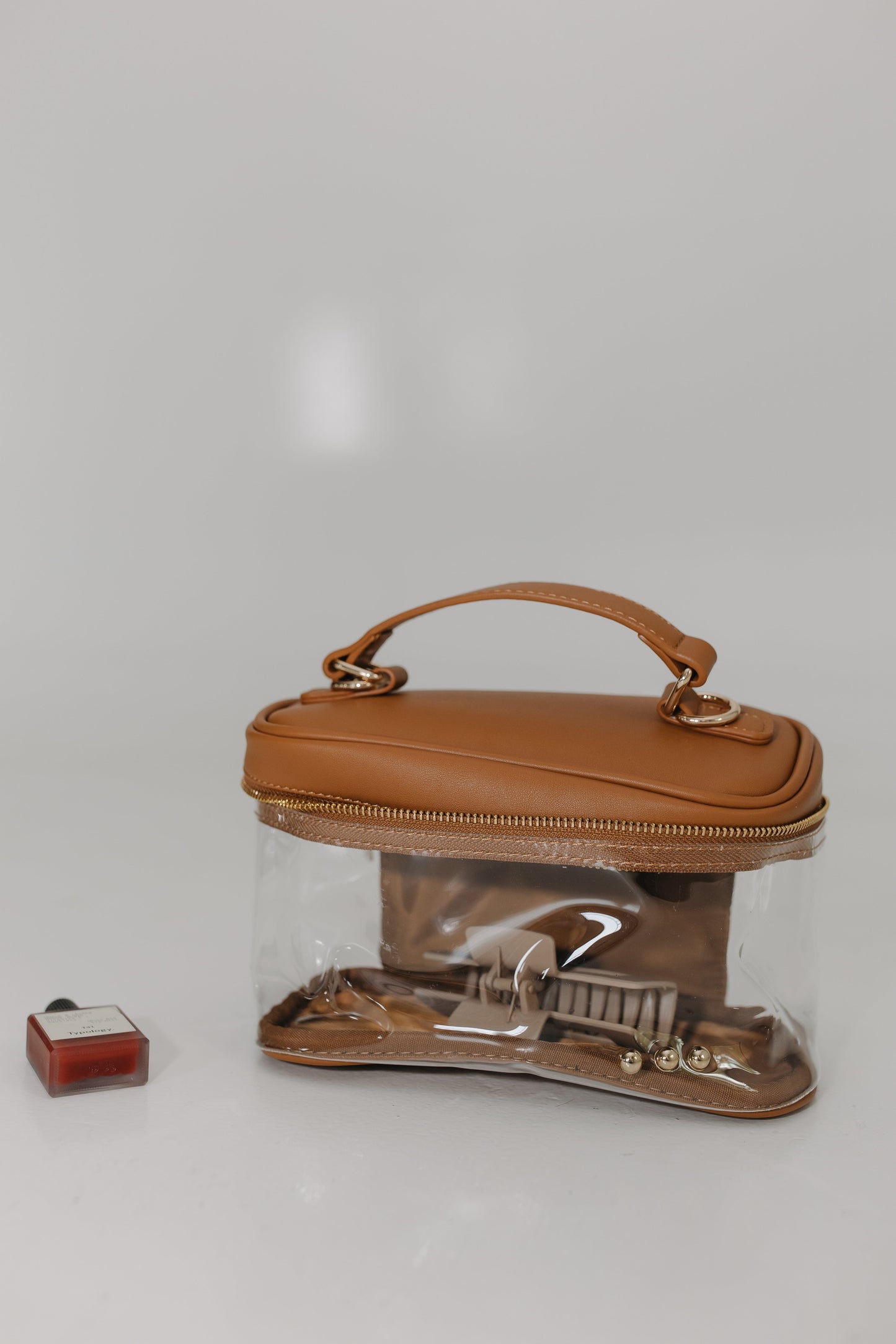 Brown handbag on a white background