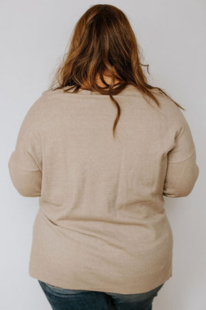 CUFFED SWEATER WITH POCKETS
