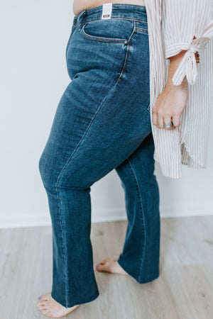 
            
                Load image into Gallery viewer, JUDY BLUE DARK WASH RAW HEM BOOTCUT JEANS
            
        