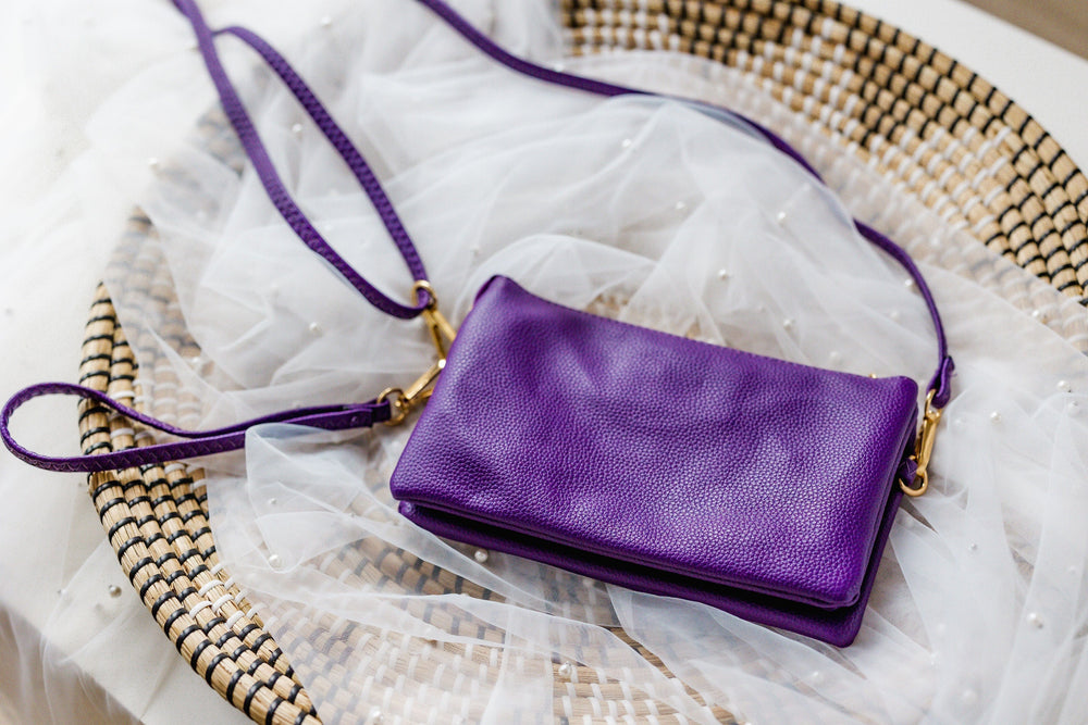 
            
                Load image into Gallery viewer, FAUX LEATHER CLUTCH IN ROYAL PURPLE
            
        