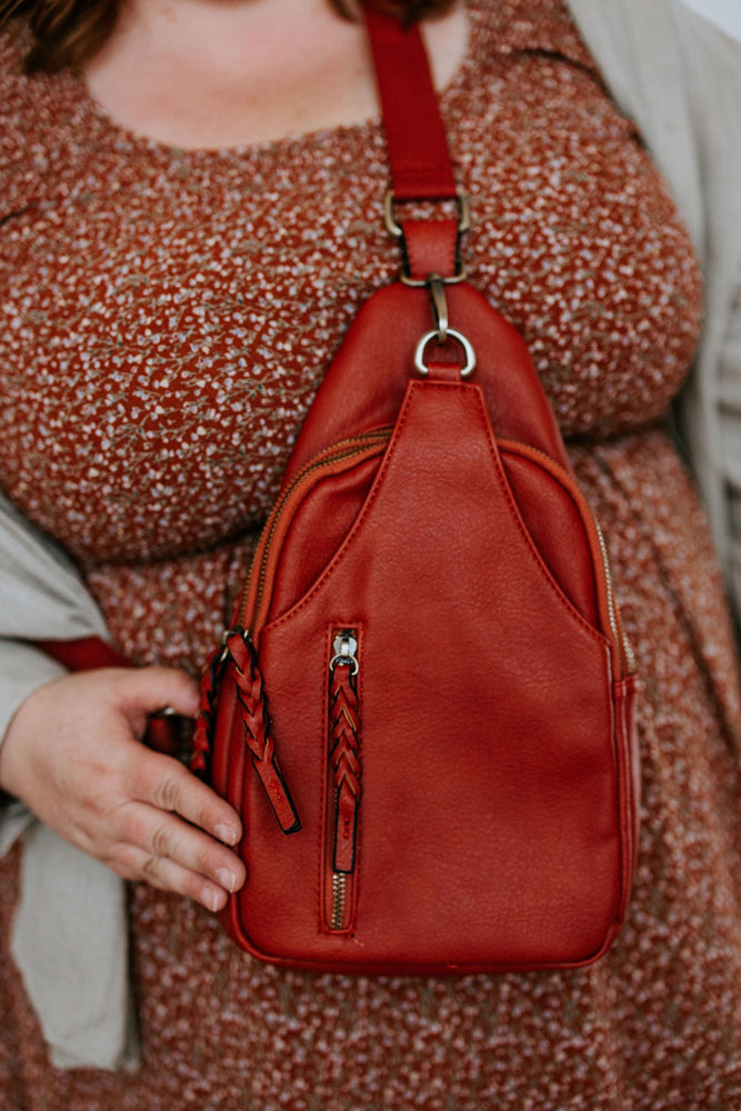 FAUX LEATHER SLING BAG IN RUST