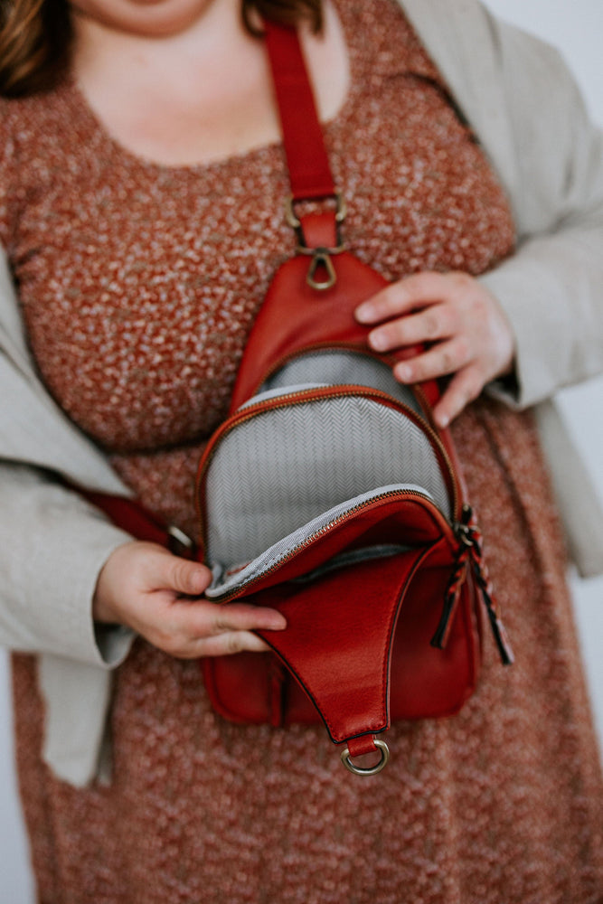 FAUX LEATHER SLING BAG IN RUST