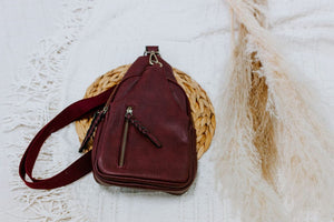 FAUX LEATHER SLING BAG IN WINE