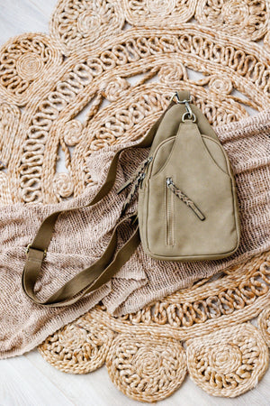 FAUX SUEDE SLING BAG IN OLIVE