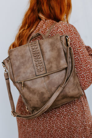 
            
                Load image into Gallery viewer, FLAPOVER BACKPACK IN DUSTED TRUFFLE
            
        