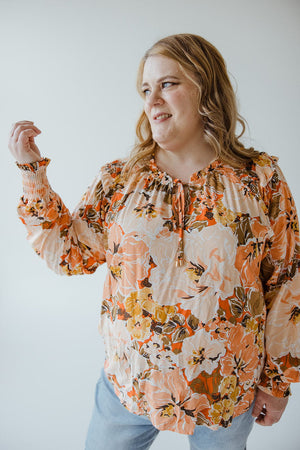 FLORAL SMOCKED SHOULDER BLOUSE WITH CUFFED BUBBLE SLEEVES