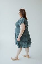 FLUTTER SLEEVE DRESS WITH TIERED SKIRT IN AEGEAN TEAL