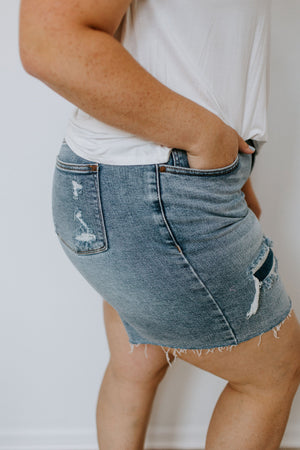 
            
                Load image into Gallery viewer, JUDY BLUE HIGH-RISE PATCHED DISTRESSED SHORTS
            
        