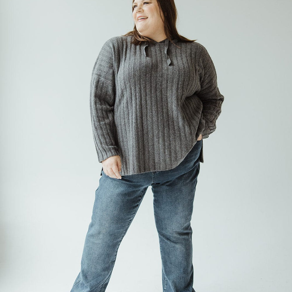 A person in a gray sweater and the Judy Blue High-Waisted Button-Fly Destroyed Hem Straight Leg jeans poses against a plain background.