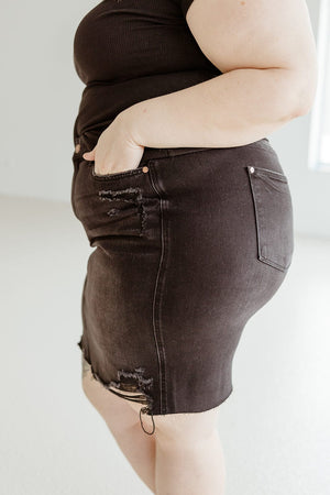 
            
                Load image into Gallery viewer, JUDY BLUE HIGH WAIST DESTROYED DENIM SKIRT IN WASHED BLACK
            
        