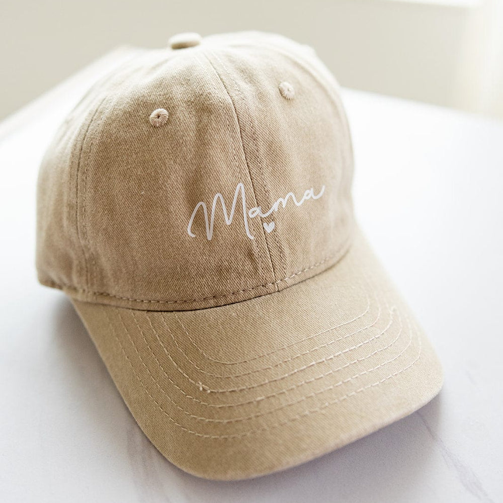 Introducing the perfect Mother's Day gift: an acid-washed beige MAMA Baseball Cap, featuring "Mama" elegantly embroidered in cursive on the front.