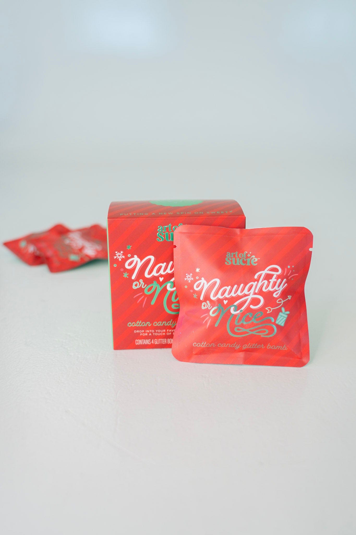 Red packaging with 'Naughty or Nice' text on a white background