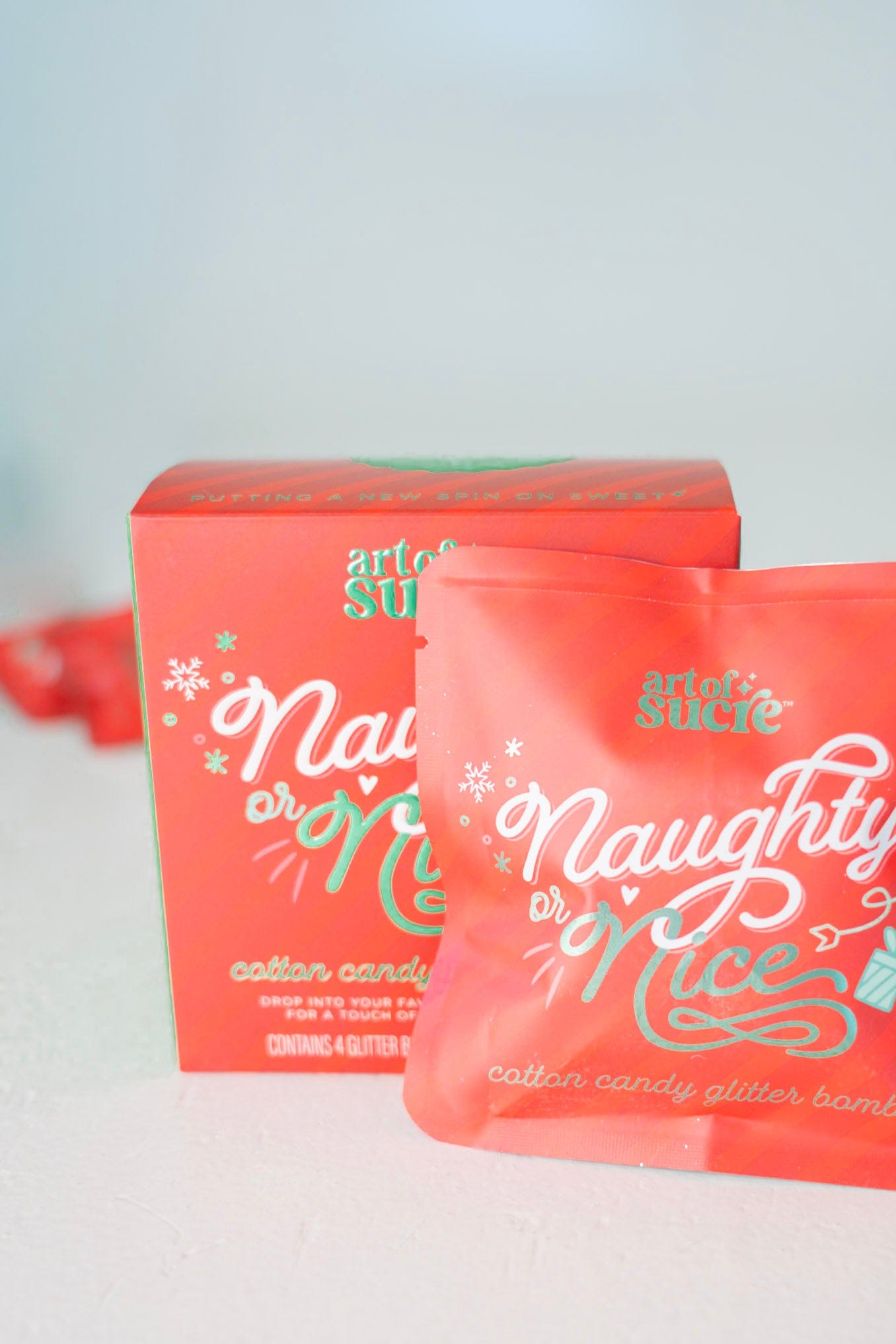 Red packaging with 'Naughty or Nice' text on a white background