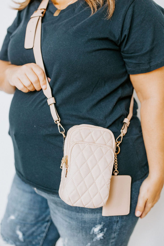 QUILTED CROSSBODY SLING BAG IN TAN