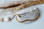 QUILTED SLING BAG WITH CHAIN DETAIL IN BONE