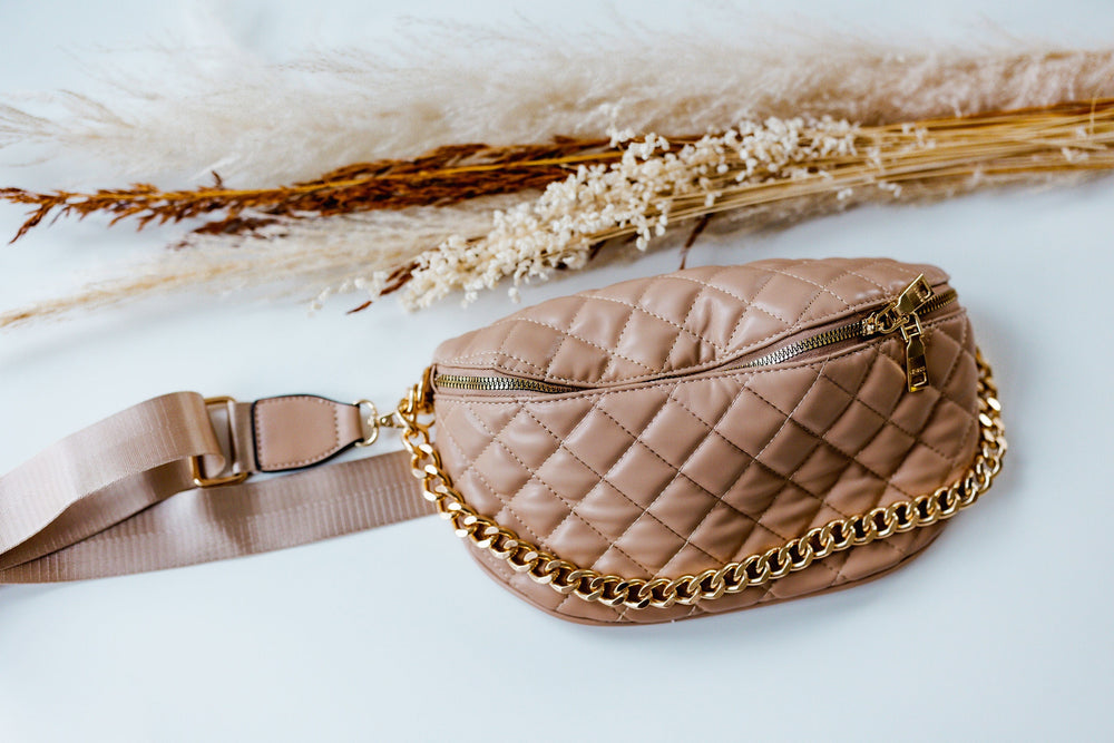 QUILTED SLING BAG WITH CHAIN DETAIL IN TAN