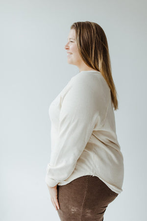 RAGLAN SLEEVE KNIT TOP WITH RAW HEM