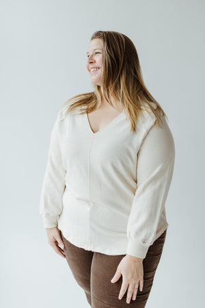 RAGLAN SLEEVE KNIT TOP WITH RAW HEM