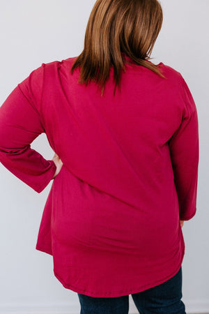 RAW EDGE TUNIC WITH POCKET DETAIL IN CRANBERRY