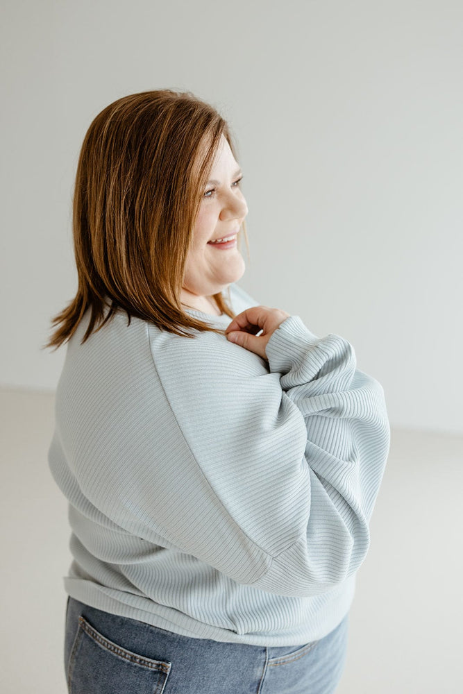 
            
                Load image into Gallery viewer, RIBBED CROPPED SWEATER IN BABY BLUE
            
        