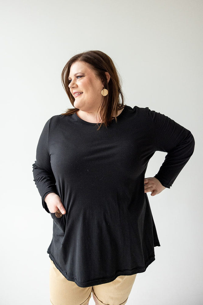 SINGLE POCKET TUNIC WITH RAW HEMS IN BLACK