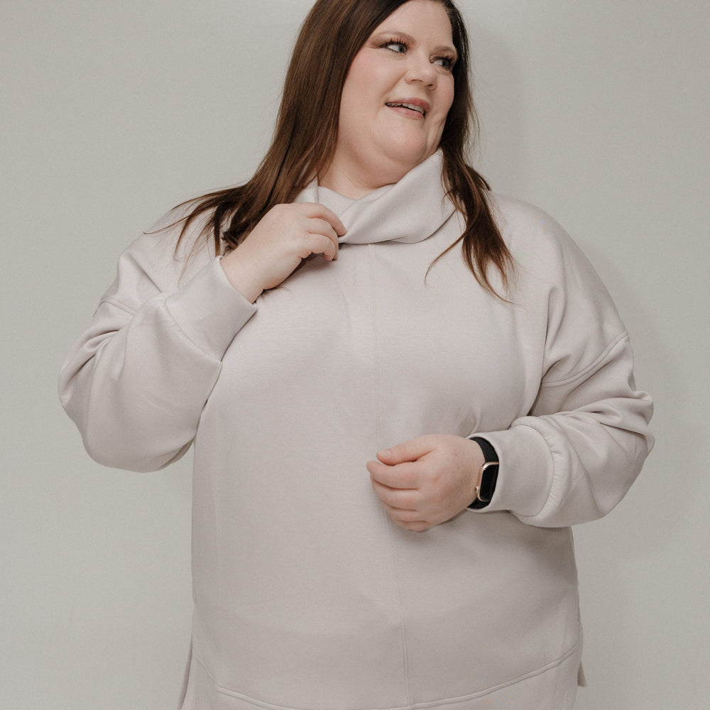 Spanx AirEssentials Turtleneck tunic against a white background
