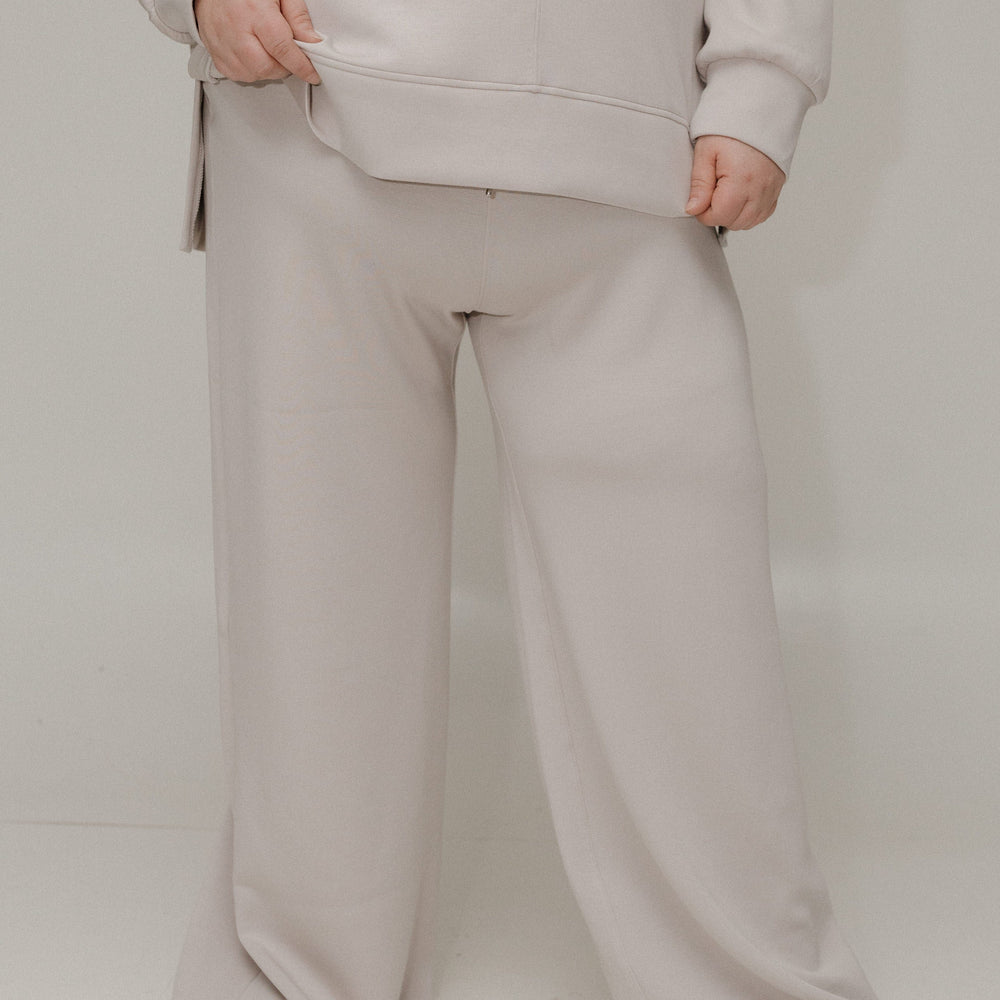 Athleisure pants against a white background