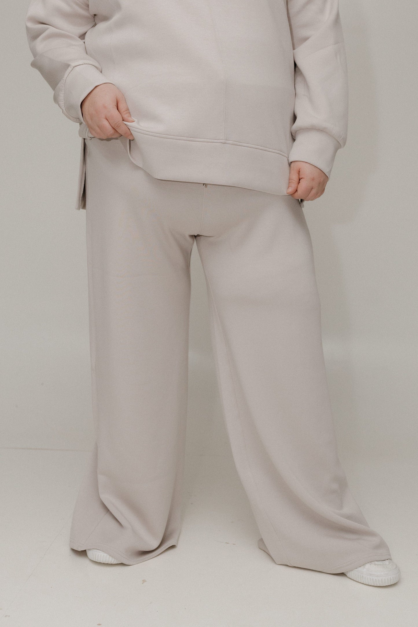 Athleisure pants against a white background
