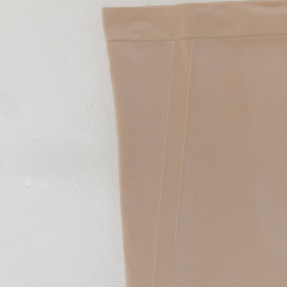 Beige fabric corner on a light gray background