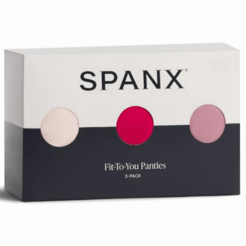 SPANX panties packaging with three pink circles on a white background