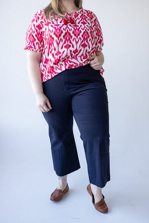 Spanx© ON-THE-GO KICK FLARE PANT WITH SILVER LINING TECHNOLOGY IN CLASSIC NAVY