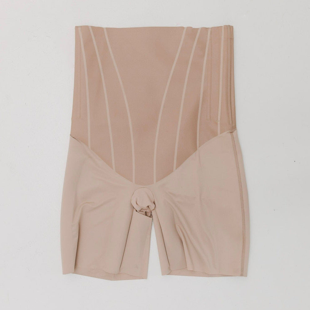 Beige high-waisted shorts with a tie detail on a white background