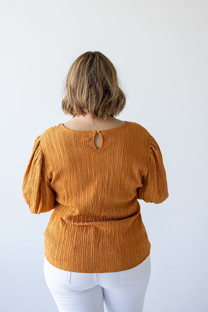 TEXTURED LONG CROP BLOUSE WITH BUBBLE SLEEVE IN AMBER GLOW
