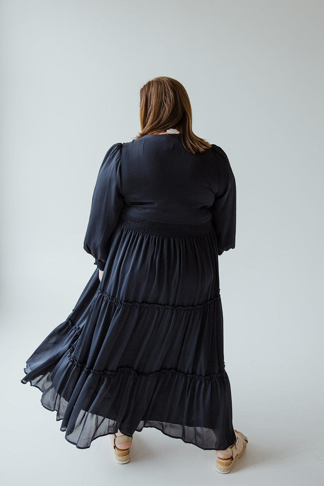 
            
                Load image into Gallery viewer, TIERED MIDI LENGTH BLOUSON SLEEVE DRESS IN MIDNIGHT
            
        