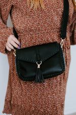 WHIPSTITCH FLAP-OVER CROSSBODY WITH TASSEL IN BLACK