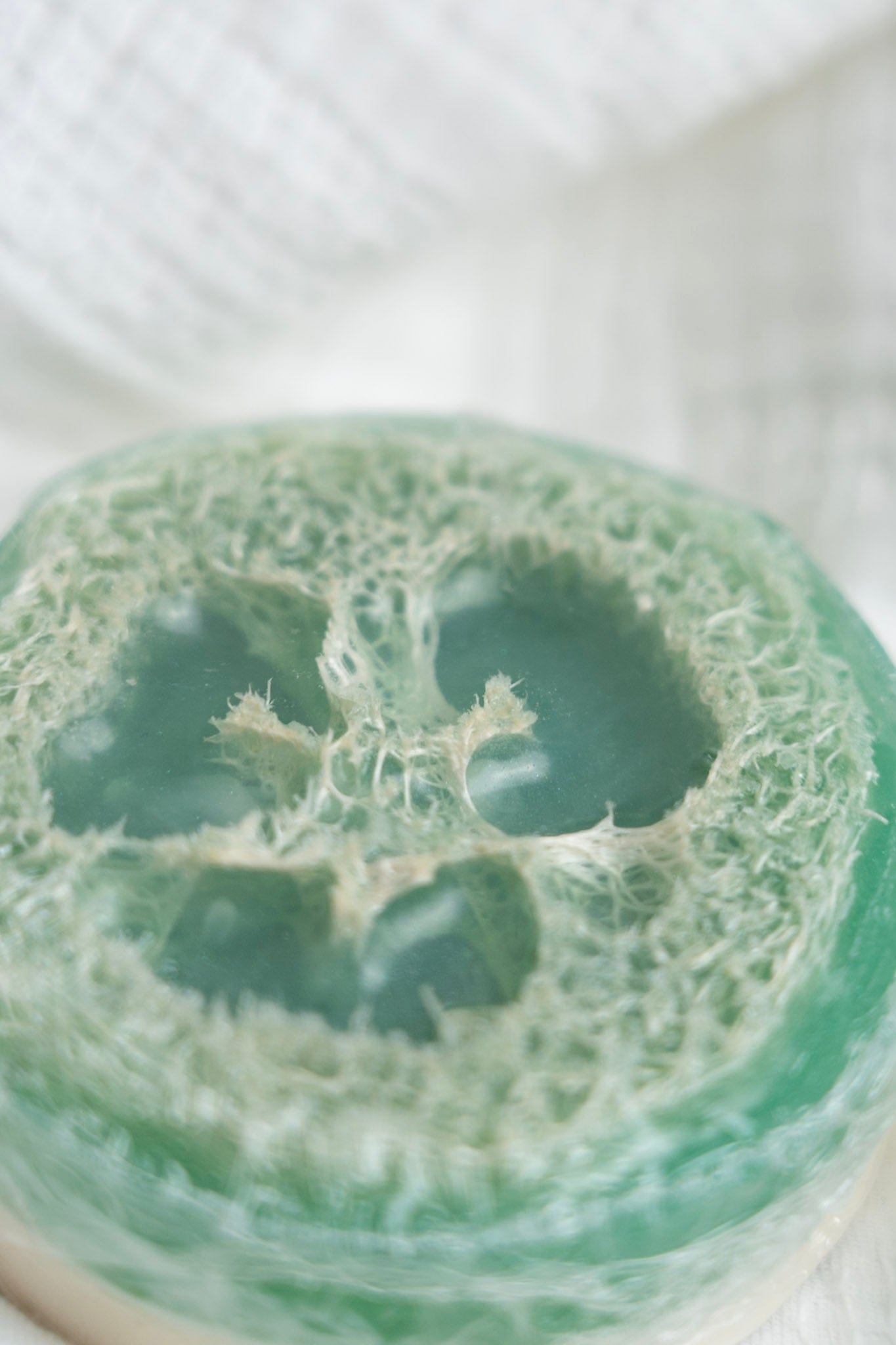 Close-up of a green soap, on a white background