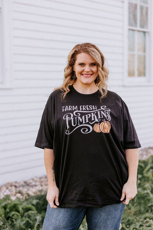
            
                Load image into Gallery viewer, &amp;quot;FARM FRESH PUMPKINS&amp;quot; GRAPHIC TEE IN BLACK
            
        