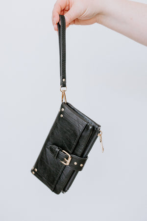 
            
                Load image into Gallery viewer, WRISTLET WALLET WITH BUCKLE DETAIL IN BLACK
            
        
