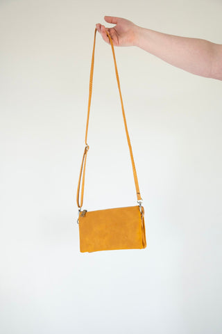 FAUX SUEDE CLUTCH IN MUSTARD - Love Marlow
