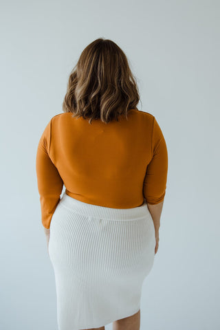 FAUX WRAP BODYSUIT WITH SIDE RUCHING IN AMBER GLOW - Love Marlow