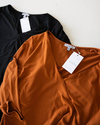 FAUX WRAP BODYSUIT WITH SIDE RUCHING IN AMBER GLOW - Love Marlow