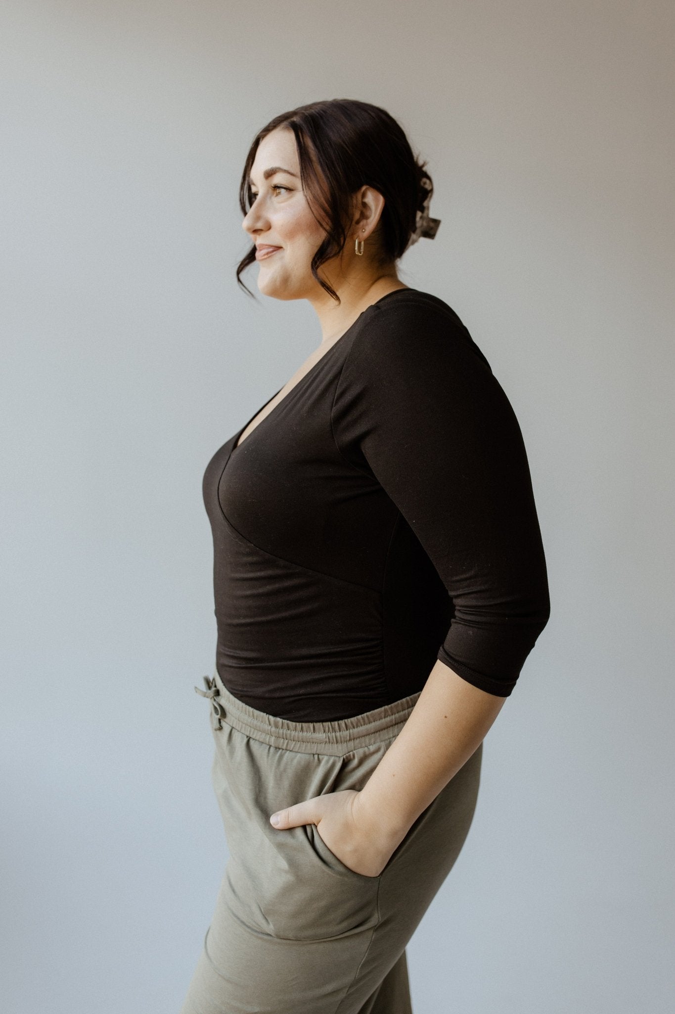 FAUX WRAP BODYSUIT WITH SIDE RUCHING IN BLACK - Love Marlow