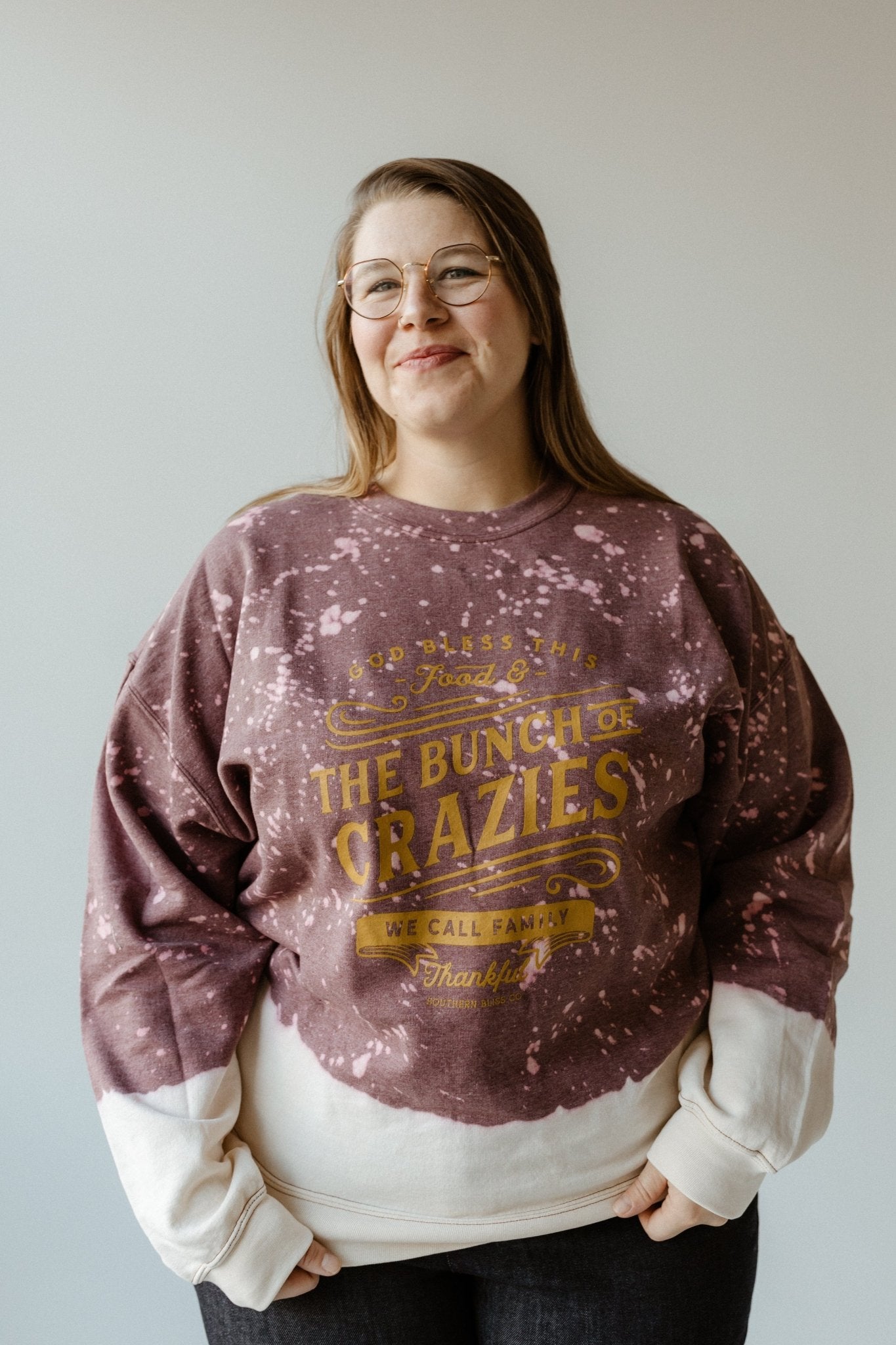 "GOD BLESS THIS FOOD AND THE BUNCH OF CRAZIES WE CALL FAMILY THANKFUL" GRAPHIC SWEATSHIRT - Love Marlow