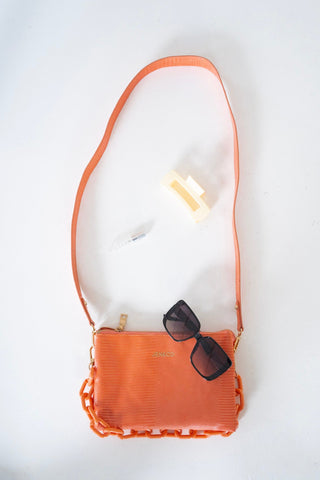 MEDIUM LIZARD PRINT CLUTCH IN CORAL - Love Marlow